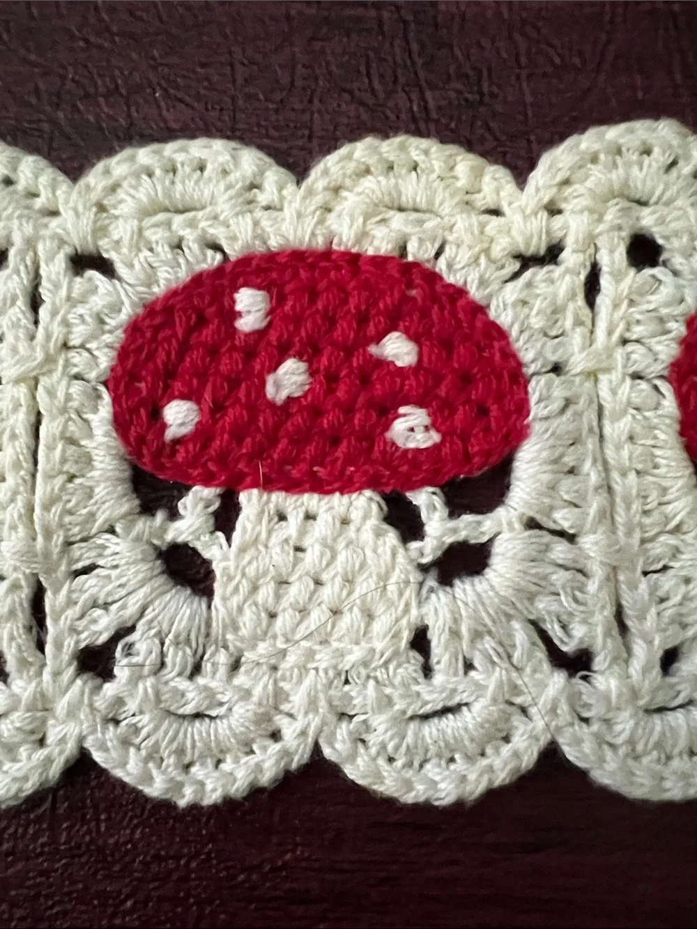 Cream Crochet Headband with Red Mushroom Accents